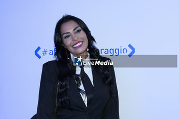 2023-11-21 - Carolina Marconi Ambassador of #afiancodelcoraggio during the Photocall of the VI edition of the #afiancodelcoraggio literary award, promoted by Roche, which sees the short 