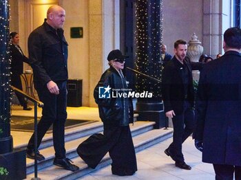 2023-11-25 - Madonna is seen leaving her hotel on November 25, 2023 in Milan, Italy. ©Photo: Cinzia Camela. - MADONNA LEAVING THE HOTEL WITH CHILDREN IN MILAN - NEWS - VIP
