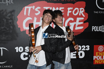 2023-09-10 - The Violin Twins Mirko and Valerio Lucia and Luca Tommassini during the Red Carper of Time fo Change at Colosseo, 10 September 2023, Rome, Italy. - RED CARPET TIME FOR CHANGE - REPORTAGE - VIP