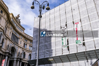 2024-03-13 - Activists from the Naples Network for Palestine and the Naples Student Network for Palestine and Handala Ali Cultural Centre symbolically occupied the scaffolding on the facade of the San Carlo theatre in Naples, lowering two banners to promote the demonstration on Friday 15 March at 2.30 p.m. in Piazza Garibaldi to stop the genocide in Palestine and to demand the release of Anan Yaeesh from prison in Terni. - ACTIVISTS PRO PALESTINE IN NAPLES - NEWS - CHRONICLE