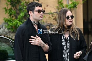 2024-04-15 - The second wife Eva Cavalli and son Robin Cavalli attend the funeral ceremony - FUNERAL OF ROBERTO CAVALLI - NEWS - CHRONICLE