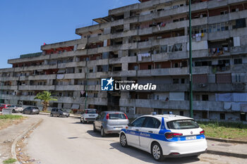 2024-09-11 - The municipal police outside the sails to deliver the eviction notice to the inhabitants. The interior of the Red Sail in Scampia, one of the two sails affected by the eviction decree. The mayor of Naples Gaetano Manfredi has signed two ordinances for the 'ad horas' eviction of the Vela Gialla and Vela Rossa in Scampia, the two buildings scheduled for demolition. The orders were signed 'for safety reasons' and 'because of the risks threatening public and private safety'. The two buildings are owned by the City of Naples and currently occupied, located in the Scampia district in Via della Resistenza, block C - Vela Gialla and block D - Vela Rossa. - VELE OF SCAMPIA, MAYOR MANFREDI ORDERS URGENT EVICTION - NEWS - CHRONICLE