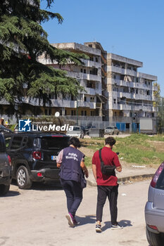 2024-09-11 - The municipal police outside the sails to deliver the eviction notice to the inhabitants. The interior of the Red Sail in Scampia, one of the two sails affected by the eviction decree. The mayor of Naples Gaetano Manfredi has signed two ordinances for the 'ad horas' eviction of the Vela Gialla and Vela Rossa in Scampia, the two buildings scheduled for demolition. The orders were signed 'for safety reasons' and 'because of the risks threatening public and private safety'. The two buildings are owned by the City of Naples and currently occupied, located in the Scampia district in Via della Resistenza, block C - Vela Gialla and block D - Vela Rossa. - VELE OF SCAMPIA, MAYOR MANFREDI ORDERS URGENT EVICTION - NEWS - CHRONICLE