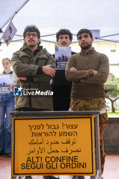 2024-11-21 - The flash-mob with the mock Israeli checkpoint set up by the students of the Political Ecology and Collettivi Autorganizzati Universitari collectives at the entrance to Porta di Massa, one of the seats of the Federico II University of Naples, 21 November 2024 - ITALY: NAPOLI, PRO-PALESTINE DEMONSTRATION  - NEWS - CHRONICLE