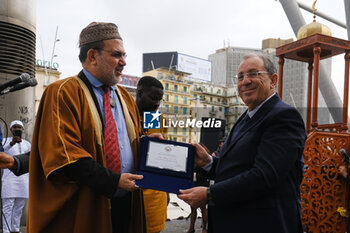 2024-04-10 - Imam Amar Abdallah presents a plaque to the prefect of Naples Michele Di Bari during the Eid al-Fitr celebrations. Eid al-Fitr is celebrated by Muslims around the world because it marks the end of the month of Ramadan. - EID AL-FITR, NAPOLI - NEWS - CULTURE