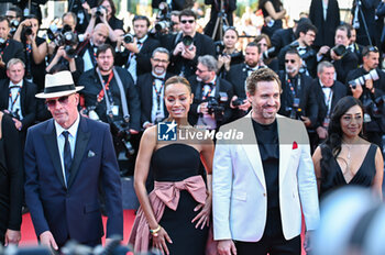 2024-05-18 - Jacques Audiard, Zoe Saldana and Edgar Ramirez attend the 