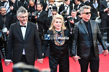 2024-05-21 - Benjamin Biolay, Catherine Deneuve and Christophe Honore attend the 