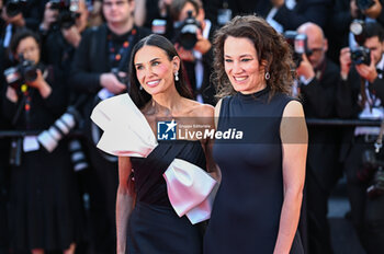 2024-05-25 - Demi Moore and Coralie Fargeat attend the Red Carpet of the closing ceremony at the 77th annual Cannes Film Festival at Palais des Festivals on May 24, 2024 in Cannes, France. - CLOSING CEREMONY - THE 77TH ANNUAL CANNES FILM FESTIVAL - NEWS - CULTURE
