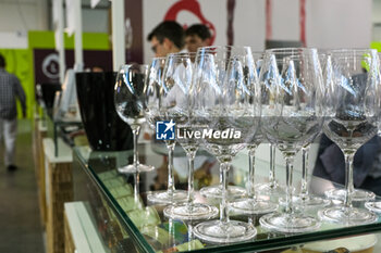 2024-04-14 - Glasses for wine tasting at the 56th Edition of Vinitaly, Internation exposition of wine and Spirits in Verona fair on April 14, 2024 in Verona. Italy - 56TH EDITION OF VINITALY - INTERNATIONAL EXPO OF WINE AND SPIRITS - NEWS - EVENTS