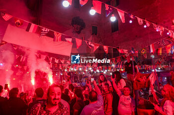 2024-10-30 - Today for Neapolitans is Diego Armando Maradona's birthday Naples. Fans tribute to Diego Armando Maradona by lighting smoke bombs and chanting chants under the mural in the Spanish quarters, if diego would still be alive today he would have celebrated his 64nd birthday. - NAPLES CELEBRATES MARADONA'S 64TH BIRTHDAY - NEWS - EVENTS