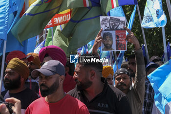 2024-06-25 - Latina, trade unions in the square with the Indian community to say no more to 'caporalato' after the death of farm labourer Satnam Singh who bled to death in a work-related accident following the severing of his arm veins. - LATINA, DEMONSTRATION AGAINST FARM LABOURERS FROM INDIA - NEWS - WORK