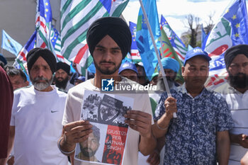 2024-06-25 - Latina, trade unions in the square with the Indian community to say no more to 'caporalato' after the death of farm labourer Satnam Singh who bled to death in a work-related accident following the severing of his arm veins. - LATINA, DEMONSTRATION AGAINST FARM LABOURERS FROM INDIA - NEWS - WORK