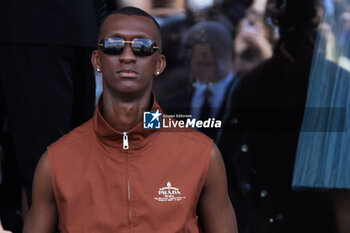 2024-06-16 - Alioune Badera leaves the Prada Spring/Summer 2025 Menswear Fashion Show on June 16, 2024 in Milan, Italy.©Photo: Cinzia Camela. - PRADA - SS 25 - CELEBRITIES - NEWS - FASHION