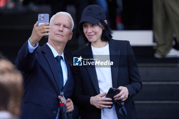 2024-06-16 - Klaus Biesenbach and Anne Imhof take a selfie leaving the Prada Spring/Summer 2025 Menswear Fashion Show on June 16, 2024 in Milan, Italy. ©Photo: Cinzia Camela. - PRADA - SS 25 - CELEBRITIES - NEWS - FASHION