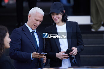 2024-06-16 - Klaus Biesenbach and Anne Imhof take a selfie leaving the Prada Spring/Summer 2025 Menswear Fashion Show on June 16, 2024 in Milan, Italy. ©Photo: Cinzia Camela. - PRADA - SS 25 - CELEBRITIES - NEWS - FASHION