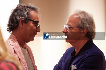 2024-06-16 - A guest and Andrea Della Valle are seen at the Tod's presentation during the Milan Menswear Spring/Summer 2025 on June 16, 2024 in Milan, Italy. ©Photo: Cinzia Camela. - TOD'S PRESENTATION - MILAN FASHION WEEK - MENSWEAR SS 25 - CELEBRITIES - NEWS - FASHION