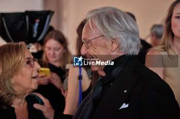 2024-06-16 - A guest and Diego Della Valle are seen at the Tod's presentation during the Milan Menswear Spring/Summer 2025 on June 16, 2024 in Milan, Italy. ©Photo: Cinzia Camela. - TOD'S PRESENTATION - MILAN FASHION WEEK - MENSWEAR SS 25 - CELEBRITIES - NEWS - FASHION