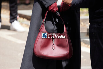 2024-06-17 - Sharl Corbeau (gloves and bag detail) is getting ready for the Gucci Men's Spring Summer 2025 Fashion Show during the Milan Fashion Week Menswear Spring/Summer 2025 at Triennale di Milano on June 17, 2024 in Milan, Italy. ©Photo: Cinzia Camela. - GUCCI - MEN'S SPRING SUMMER 2025 FASHION SHOW - CELEBRITIES - NEWS - FASHION