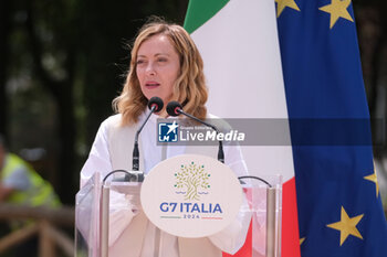 2024-05-28 - Italian Prime Minister Giorgia Meloni during the inauguration of the 'Centro Pino Daniele' sports centre in Caivano, 300 metres from the Parco Verde, opening the sports facilities of the former Delphinia centre to the city. The 5-hectare sports centre will not only return the swimming pool to the city but will also have equipment for 44 sports disciplines, with 20 fields and playgrounds. The project involved Sport and Health, the Army and the Fiamme Oro of the State Police. A 500-seat theatre and an amphitheatre for 1,000 people will also be built. The urban park will be named after Rosario Livatino. - PRIME MINISTER GIORGIA MELONI IN CAIVANO - NEWS - POLITICS