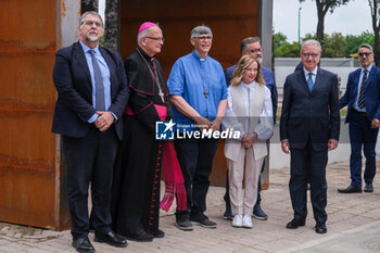 2024-05-28 - Italian Prime Minister Giorgia Meloni with the extraordinary commissioner of Caivano Fabio Ciciliano (L), Don Angelo Spinillo Bishop of Aversa, Don Maurizio Patriciello parish priest of the Parco Verde church in Caivano, Adriano Police Prete of Caivano and Alfredo Mantovano, undersecretary to the presidency of the council during the inauguration of the 'Centro Pino Daniele' sports centre in Caivano, 300 metres from the Parco Verde, opening the sports facilities of the former Delphinia centre to the city. The 5-hectare sports centre will not only return the swimming pool to the city but will also have equipment for 44 sports disciplines, with 20 fields and playgrounds. The project involved Sport and Health, the Army and the Fiamme Oro of the State Police. A 500-seat theatre and an amphitheatre for 1,000 people will also be built. The urban park will be named after Rosario Livatino. - PRIME MINISTER GIORGIA MELONI IN CAIVANO - NEWS - POLITICS