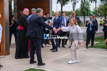 2024-05-28 - Italian Prime Minister Giorgia Meloniduring the inauguration of the 'Centro Pino Daniele' sports centre in Caivano, 300 metres from the Parco Verde, opening the sports facilities of the former Delphinia centre to the city. The 5-hectare sports centre will not only return the swimming pool to the city but will also have equipment for 44 sports disciplines, with 20 fields and playgrounds. The project involved Sport and Health, the Army and the Fiamme Oro of the State Police. A 500-seat theatre and an amphitheatre for 1,000 people will also be built. The urban park will be named after Rosario Livatino. - PRIME MINISTER GIORGIA MELONI IN CAIVANO - NEWS - POLITICS