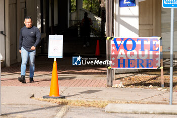 2024-11-05 - A voter leaves the polling place at a church. Voters in the Texas Capital were met with short lines at most polling places across the metropolitan area, as more than 9 million Texans took advantage of the state’s ease of early voting ahead of Election Day. - VOTING DAY - UNITED STATES PRESIDENTIAL ELECTION IN TEXAS - NEWS - POLITICS