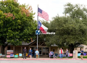 2024-11-05 - Campaign workers greet voters outside a polling place, as poll-goers were met with short lines at most polling places across the metropolitan area, as more than 9 million Texans took advantage of the state’s ease of early voting ahead of Election Day. - VOTING DAY - UNITED STATES PRESIDENTIAL ELECTION IN TEXAS - NEWS - POLITICS