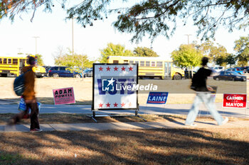 2024-11-05 - Voters head to the entrance of a polling place in the final hours of voting in the US General Election. Voters across the state capital area were met with short lines at most polling places throughout the day, as more than 9 million Texans took advantage of the state’s ease of early voting ahead of Election Day. - VOTING DAY - UNITED STATES PRESIDENTIAL ELECTION IN TEXAS - NEWS - POLITICS