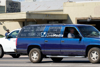 2024-10-29 - A vehicle displays a political slogan during the early voting period in Texas for the U.S. Presidential Election - UNITED STATES PRESIDENTIAL ELECTION - EARLY VOTING SCENES IN TEXAS - REPORTAGE - POLITICS