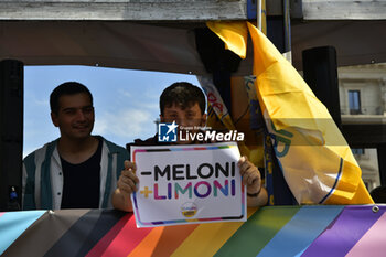 2024-06-15 - People showing banners during the annual Pride Parade in the streets of Rome - ROMA PRIDE 2024 - NEWS - SOCIETY