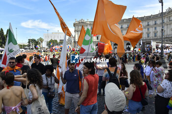 2024-06-15 - People showing banners during the annual Pride Parade in the streets of Rome - ROMA PRIDE 2024 - NEWS - SOCIETY