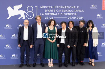 2024-09-06 - (L-R) Denis Vaslin, Nicolas R. De La Mothe, Sonia Buchman, Director Wang Bing, Vincent Wang, Gilles Chanial and guest attend the 