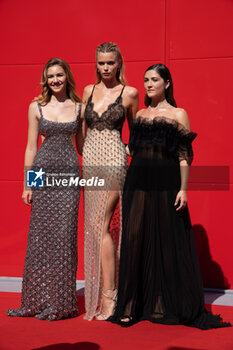 2024-09-07 - (R-L) Isabelle Fuhrman, Abbey Lee and Georgia MacPhail attend the 