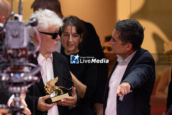 2024-09-07 - Pedro Almodovar poses with the golden Lion Award for The room next door