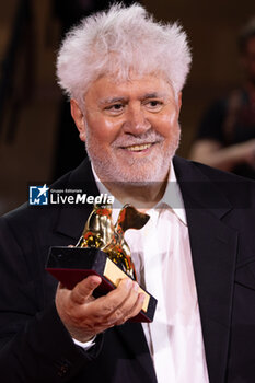 2024-09-07 - Pedro Almodovar poses with the golden Lion Award for The room next door