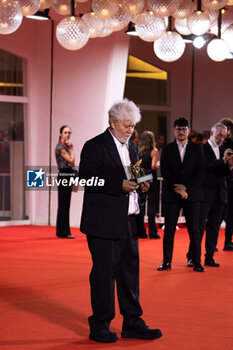 2024-09-07 - Pedro Almodovar poses with the golden Lion Award for The room next door