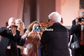 2024-09-07 - Pedro Almodovar poses with the golden Lion Award for The room next door