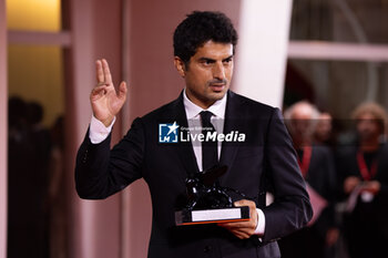 2024-09-07 - Murat Firatoglu poses with the Special Jury Prize for “One Of Those Days When Hemme Dies” during the 81st Venice International Film Festival at Palazzo del Cinema on September 07, 2024 in Venice, Italy. ©Photo: Cinzia Camela. - 2024 WINNERS PHOTOCALL - THE 81ST VENICE INTERNATIONAL FILM FESTIVAL - NEWS - VIP