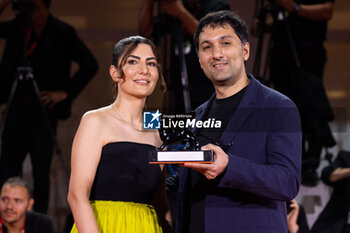 2024-09-07 - Zayne Akyol and Arshia Shakiba pose with the Best Short Film Award for “Who Loves The Sun” during the 81st Venice International Film Festival at Palazzo del Cinema on September 07, 2024 in Venice, Italy. ©Photo: Cinzia Camela. - 2024 WINNERS PHOTOCALL - THE 81ST VENICE INTERNATIONAL FILM FESTIVAL - NEWS - VIP