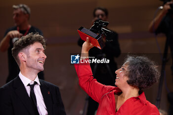 2024-09-07 - Barry Gene Murphy and May Abdalla pose during a photocall after receiving the Venice Immersive Best Experience Award for 'Impulse' during the award ceremony of the 81st Venice Film Festival on September 7, 2024 at Venice Lido. ©Photo: Cinzia Camela. - 2024 WINNERS PHOTOCALL - THE 81ST VENICE INTERNATIONAL FILM FESTIVAL - NEWS - VIP