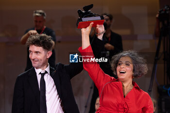 2024-09-07 - Barry Gene Murphy and May Abdalla pose during a photocall after receiving the Venice Immersive Best Experience Award for 'Impulse' during the award ceremony of the 81st Venice Film Festival on September 7, 2024 at Venice Lido. ©Photo: Cinzia Camela. - 2024 WINNERS PHOTOCALL - THE 81ST VENICE INTERNATIONAL FILM FESTIVAL - NEWS - VIP