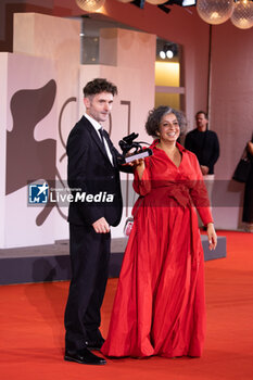 2024-09-07 - Barry Gene Murphy and May Abdalla pose during a photocall after receiving the Venice Immersive Best Experience Award for 'Impulse' during the award ceremony of the 81st Venice Film Festival on September 7, 2024 at Venice Lido. ©Photo: Cinzia Camela. - 2024 WINNERS PHOTOCALL - THE 81ST VENICE INTERNATIONAL FILM FESTIVAL - NEWS - VIP