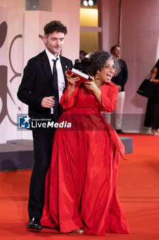 2024-09-07 - Barry Gene Murphy and May Abdalla pose during a photocall after receiving the Venice Immersive Best Experience Award for 'Impulse' during the award ceremony of the 81st Venice Film Festival on September 7, 2024 at Venice Lido. ©Photo: Cinzia Camela. - 2024 WINNERS PHOTOCALL - THE 81ST VENICE INTERNATIONAL FILM FESTIVAL - NEWS - VIP