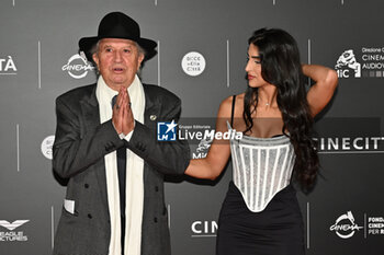 2024-10-14 - Vittorio Storaro and Eleonora Storaro attend the red carpet for the film Megalopolis at Cinecitta Studios on October 14, 2024 in Rome, Italy.

 - RED CARPET MEGALOPOLIS - NEWS - VIP