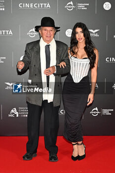 2024-10-14 - Vittorio Storaro and Eleonora Storaro attend the red carpet for the film Megalopolis at Cinecitta Studios on October 14, 2024 in Rome, Italy.

 - RED CARPET MEGALOPOLIS - NEWS - VIP