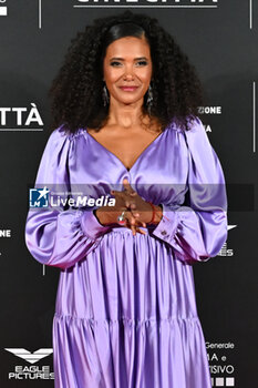 2024-10-14 - Denny Mendez attend the red carpet for the film Megalopolis at Cinecitta Studios on October 14, 2024 in Rome, Italy.

 - RED CARPET MEGALOPOLIS - NEWS - VIP