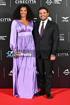 2024-10-14 - Denny Mendez and Gimmi Cangiano attend the red carpet for the film Megalopolis at Cinecitta Studios on October 14, 2024 in Rome, Italy.

 - RED CARPET MEGALOPOLIS - NEWS - VIP