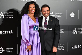 2024-10-14 - Denny Mendez and Gimmi Cangiano attend the red carpet for the film Megalopolis at Cinecitta Studios on October 14, 2024 in Rome, Italy.

 - RED CARPET MEGALOPOLIS - NEWS - VIP