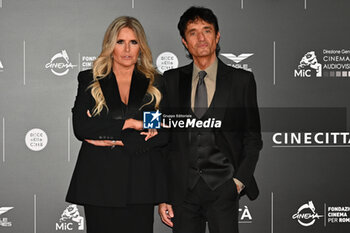 2024-10-14 - Tiziana Rocca and Giulio Base attend the red carpet for the film Megalopolis at Cinecitta Studios on October 14, 2024 in Rome, Italy.

 - RED CARPET MEGALOPOLIS - NEWS - VIP