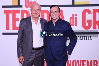 2024-11-18 - Claudio Bisio and Alessandro Araimo during the Photocall of the movie UNA TERAPIA DI GRUPPO on November 18, 2024 at Cinema The Space, Rome, Italy - UNA TERAPIA DI GRUPPO - NEWS - VIP